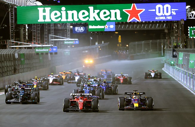 Drivers head out toward turn one at the start of the inaugural Formula One Heineken Silver Las Vegas Grand Prix on Saturday, Nov. 18, 2023.