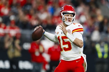 Kansas City Chiefs quarterback Patrick Mahomes (15) looks to throw the ball during the first half of an NFL football game against the Las Vegas Raiders at Allegiant Stadium Sunday, Nov. 26, 2023.