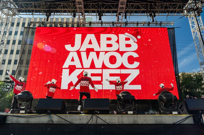 Participants dance and enjoy the pre-show festivities, featuring performances by the Blue Man Group, Jabbawockeez, and many more at the Las Vegas Great Santa Run on Saturday, Dec. 2, 2023.