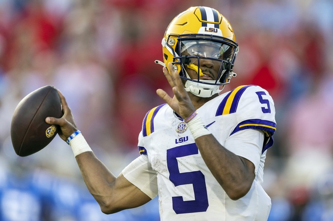 LSU quarterback Jayden Daniels throws the ball during the first half of an NCAA football game against Mississippi on Saturday, Sept. 30, 2023, in Oxford, Miss.