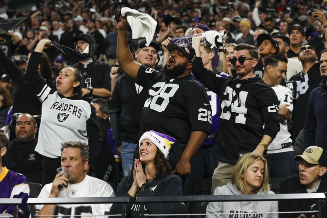 Las Vegas Raiders fans cheer during the second half of an NFL football game against the Minnesota Vikings at Allegiant Stadium Sunday, Dec. 10, 2023.