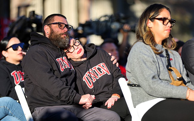 Ted Weisman and his wife Annie listen to Rise Up, sung by Christian Shelton during memorial vigil at UNLV Wednesday, Dec. 13, 2023. Three UNLV professors were killed and another critically wounded when a gunman opened fire in Beam Hall on UNLV campus Wednesday, Dec. 6.