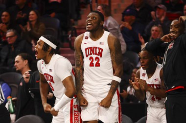 UNLV Rebels forward Karl Jones (22) reacts after his team scores against the Creighton Bluejays during the second half of a college basketball game at The Dollar Loan Center in Henderson Wednesday, Dec. 13, 2023.