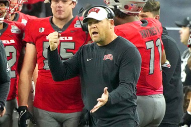 UNLV head coach Barry Odom reacts to his defense during the second half of the Guaranteed Rate Bowl NCAA college football game against Kansas Tuesday, Dec. 26, 2023, in Phoenix. Kansas won 49-36.