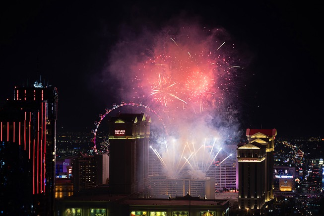 New Years fireworks explode over Las Vegas Strip casinos as viewed from the GhostBar at the Palms Monday, Jan. 1, 2024.