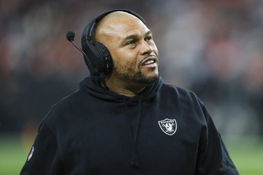 Las Vegas Raiders interim head coach Antonio Pierce stands on the field during the first half of an NFL football game against the Denver Broncos at Allegiant Stadium Sunday, Jan. 7, 2024.