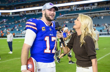 Buffalo Bills quarterback Josh Allen (17) smiles as he is interviewed by NBC Sports sideline reporter Melissa Stark on the field after the Bills defeated the Miami Dolphins during an NFL football game, Sunday, Jan. 7, 2024, in Miami Gardens, Fla.