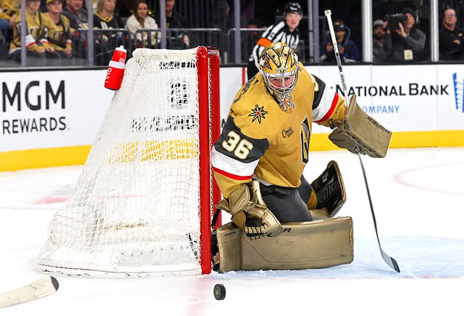 Vegas Golden Knights goaltender Logan Thompson (36) blocks a shot on goal during the second period of an NHL hockey game against the New York Rangers at T-Mobile Arena Thursday, Jan. 18, 2024.