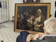 Dr. Francis Wood, 96, admires the John Opie painting, "The Schoolmistress", that was stolen from his parents' Newark, N.J. home in 1969 and recently returned to him on Thursday, Jan. 11, 2024.