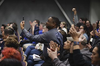 Attendees react as the Clark County School District Board members vote 4-3 to deny Superintendent Jesus Jaras resignation proposal during a meeting at Henderson City Hall Wednesday, Feb. 7, 2024.