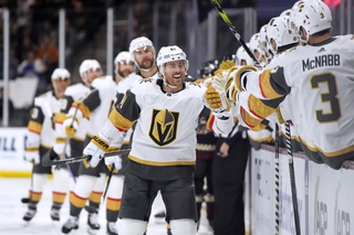Vegas Golden Knights right wing Jonathan Marchessault (81) is congratulated after scoring against the Arizona Coyotes during the first period Thursday, Feb. 8, 2024, in Tempe, Ariz. 


