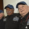 Members of the Never Miss a Super Bowl Club, from the left, Tom Henschel, Gregory Eaton, and Don Crisman pose for a group photograph during a welcome luncheon, in Atlanta, Friday, Feb. 1, 2019.