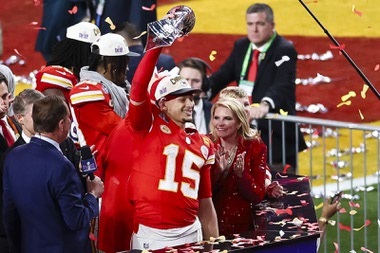 Kansas City Chiefs quarterback Patrick Mahomes (15) holds the The Vince Lombardi Trophy after his team defeats the San Francisco 49ers, 25-22, during overtime of the NFL Super Bowl 58 football game at Allegiant Stadium in Las Vegas Sunday, Feb. 11, 2024.