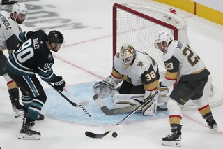 Vegas Golden Knights goaltender Logan Thompson (36) and defenseman Alec Martinez (23) defend against a shot attempt by San Jose Sharks right wing Justin Bailey (90) during the third period in San Jose, Calif., Monday, Feb. 19, 2024. 


