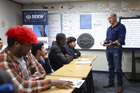 Television personality Mike Rowe, known for creating and hosting the “Dirty Jobs” reality show, dropped by Western High School to announce the new Warrior Pathway Program ...