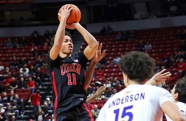UNLV guard D.J. Thomas (11) takes a shot against San Jose State during the second half of an NCAA basketball game at the Thomas & Mack Center Saturday, March 2, 2024.