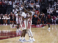 When Kevin Kruger was named head coach at UNLV three years ago, he made it his top priority to recruit local star D.J. Thomas. Smart move. Thomas put the Scarlet and Gray on his back on Tuesday, scoring 19 points to lead UNLV to a program-affirming 62-58 win over No. 21 San Diego State ...