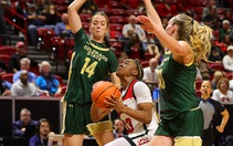 UNLV Lady Rebels guard Amarachi Kimpson (33) drives to the basket between Colorado State Rams guards Marta Leimane (14) and Hannah Ronsiek (30) in the ...
