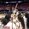 UNLV Lady Rebels celebrate after defeating the San Diego State Aztecs, 66-49, to win the Mountain West Conference championship game at the Thomas & Mack Center Wednesday, March 13, 2024.  Lady Rebels forward Alyssa Brown, the game MVP, is at upper center with Erica Collins (31).