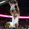UNLV Rebels forward Rob Whaley Jr. (5) hangs on the rim after dunking against the San Diego State Aztecs during overtime of an NCAA college basketball game in the quarterfinal round of the Mountain West Conference tournament at the Thomas & Mack Center Thursday, March 14, 2024.