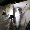 Asbestos Removal Technologies Inc. staff work on asbestos abatement in Howell, Mich., Oct. 18, 2017. The Environmental Protection Agency on Monday, March 18, 2024, announced a comprehensive ban on asbestos, a carcinogen that kills tens of thousands of Americans every year but is still used in some chlorine bleach, brake pads and other products. 


