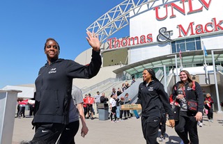 UNLV Lady Rebels, including center Desi-Rae Young, left, receive a send-off before boarding a bus at the Thomas & Mack Center Wednesday, March 20, 2024. The Lady Rebels will face the Creighton Bluejays in the first round of the women’s NCAA tournament in Los Angeles on Saturday.