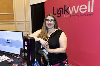 Kate Kruk, a partner & engagement director at Lynkwell, poses during the EV Charging Summit & Expo at the Mirage Thursday, March 21, 2024.