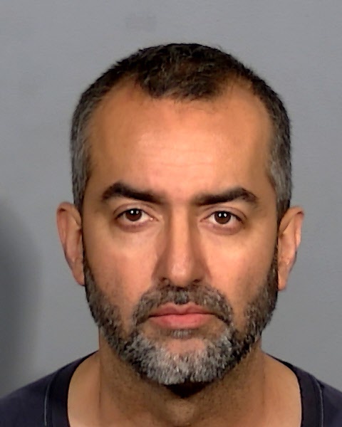 Haroon Zakai, 44, is seen in an undated photo. Zakai was arrested Wednesday, March 20, 2024, on charges of privately monitoring conversations at Gwendolyn Woolley elementary School, where he worked, according to Clark County School District.