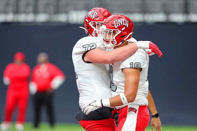 UNLV Rebels tight end Kaleo Ballungay, right, is congratulated by offensive lineman Will Thomas (72) after Ballungay’s touchdown during the UNLV Football Spring Showcase at Allegiant Stadium Saturday, April 6, 2024.