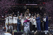 South Carolina players and coaches celebrate after the Final Four college basketball championship game against Iowa in the women’s NCAA Tournament, Sunday, April 7, 2024, ...