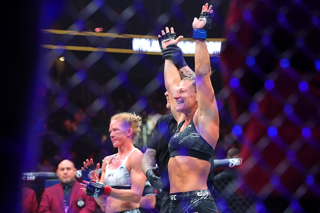 Kayla Harrison is announced as the winner over Holly Holm in a women’s bantamweight bout during UFC 300 at T-Mobile Arena Saturday, April 13, 2024, in Las Vegas. Harrison won by submission in the second round. 