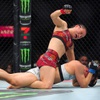 UFC Women’s strawweight champion Zhang Weili punches Yan Xiaonan in a women’s title fight during UFC 300 at T-Mobile Arena Saturday, April 13, 2024, in Las Vegas. Zhang retained her title by unanimous decision.