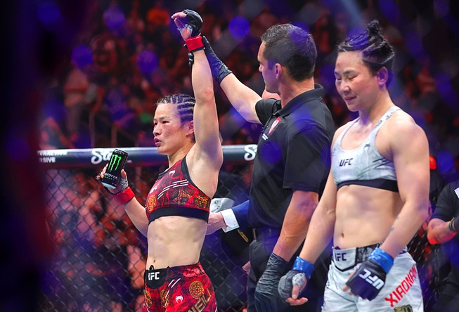 UFC Women’s strawweight champion Zhang Weili is announced as the winner over Yan Xiaonan in a women’s title fight during UFC 300 at T-Mobile Arena Saturday, April 13, 2024, in Las Vegas. Zhang retained her title by unanimous decision.