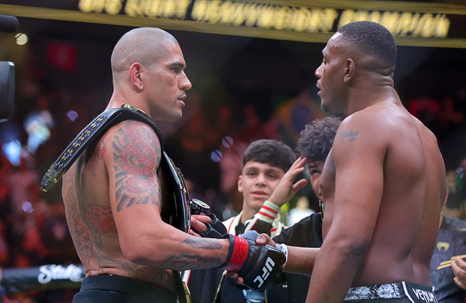 UFC light heavyweight champion Alex Pereira, left, shakes hands with Jamahal Hill after a title fight during UFC 300 at T-Mobile Arena Saturday, April 13, 2024, in Las Vegas. Pereira retained his title with a first-round TKO.