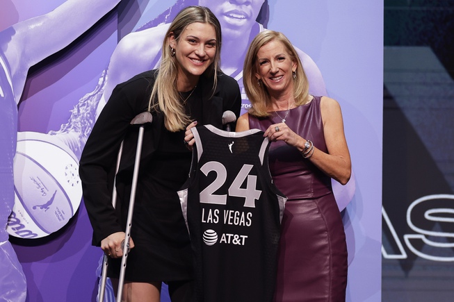 Virginia Tech's Elizabeth Kitley, left, poses for a photo with WNBA commissioner Cathy Engelbert, right, after being selected 24th overall by the Las Vegas Aces during the second round of the WNBA basketball draft on Monday, April 15, 2024, in New York. 


