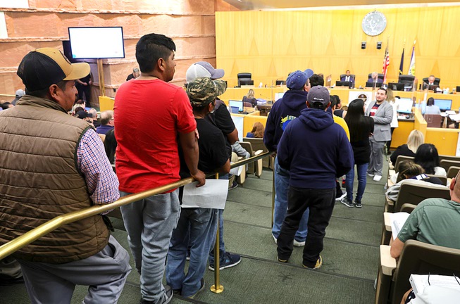 People, many of them street vendors, line up to comment on a street vendor ordinance during a Clark County meeting on a street vendor ordinance at the Clark County Government Center Tuesday, April 16, 2024.
