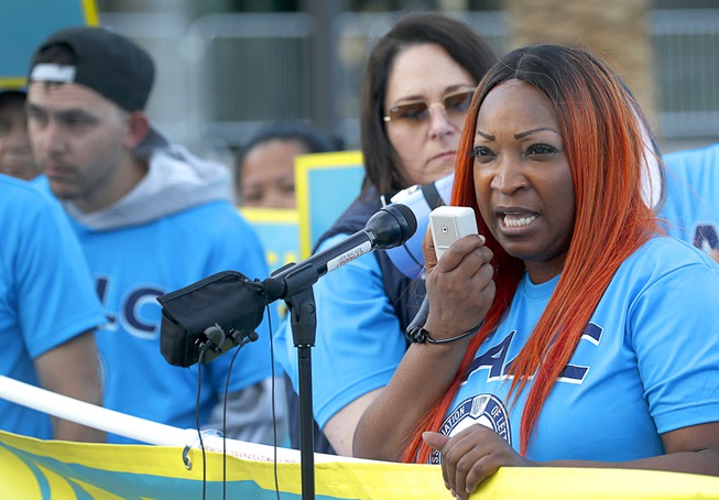 Keisha Lewis, national business agent for the the National Association of Letter Carriers (NALC), speaks during a demonstration by letter carriers in front of the Lloyd George Federal Building in downtown Las Vegas Wednesday, April 17, 2024.