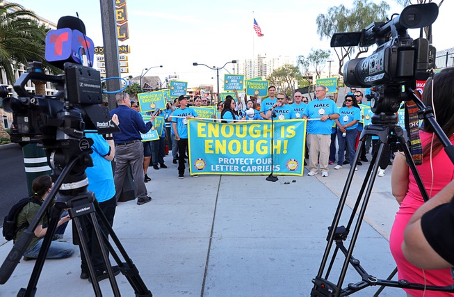 Brian Renfroe, national president of the National Association of Letter Carriers (NALC), speaks during a demonstration by letter carriers in front of the Lloyd George Federal Building in downtown Las Vegas Wednesday, April 17, 2024.