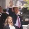 Former president Donald Trump leaves Trump Tower on his way to Manhattan criminal court, Friday, April 19, 2024, in New York. Jury selection in the hush money trial of former President Donald Trump is set to resume after a frenetic day that eventually saw all 12 jurors sworn in along with one alternate juror. 