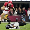 Georgia tight end Brock Bowers (19) leaps over TCU safety Millard Bradford (28) during the second half of the national championship NCAA College Football Playoff game, Monday, Jan. 9, 2023, in Inglewood, Calif. In three seasons at Georgia, Bowers caught 175 passes for 2,538 yards in 40 games and scored 31 total touchdowns with five of them coming as a runner as the Bulldogs did whatever they could to get the ball in his hands.