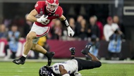 After months of speculation, the Las Vegas Raiders opted to keep their pick and select Georgia tight end Brock Bowers at No. 13 overall in the 2024 NFL Draft. Bowers was considered one ...
