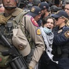 Photo: A woman is arrested at a pro-Palestinian protest a
