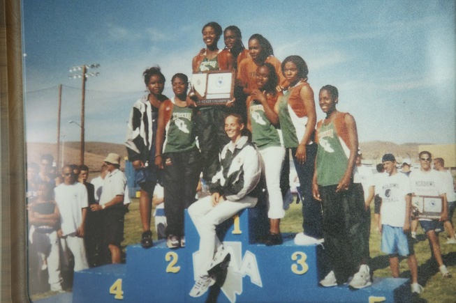 A photo of Monique Lewis, top right, after she won her team the record for the 100 and 200 meter relay, is shown at Mojave high school Thursday, April 25, 2024.