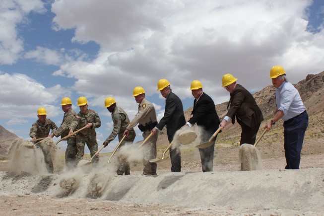 Nevada National Guard members and Clark County officials break ground on a firing range on April 25, 2024.