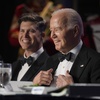 President Joe Biden, right, and host Colin Jost attend the White House Correspondents' Association Dinner at the Washington Hilton, Saturday, April 27, 2024, in Washington. 