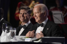 President Joe Biden, right, and host Colin Jost attend the White House Correspondents' Association Dinner at the Washington Hilton, Saturday, April 27, 2024, in Washington. 