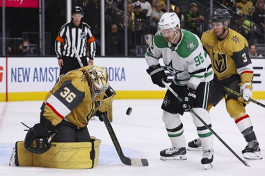 Vegas Golden Knights goaltender Logan Thompson (36) blocks a shot as Dallas Stars center Matt Duchene (95) watches during the second period in Game 4 of an NHL hockey Stanley Cup first-round playoff series at T-Mobile arena Monday, April 29, 2024.