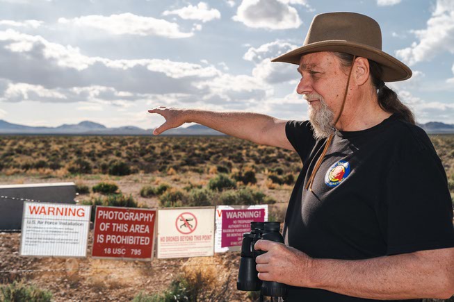 Joerg Arnu, a 62-year-old Rachel resident and a love for military aviation, runs the town’s tourism website and Dreamland Resort, a hub for information related to Area 51, explains some of the technology believed to be used behind the gates of Area 51 in Rachel, Nevada on Thursday, April 25, 2024.