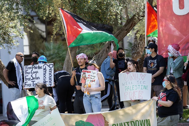 Pro Palestine supporters demonstrate on UNLV’s campus, near the student union Wed. May 1, 2024.