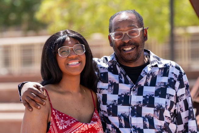 Father and daughter duo shared one class and will be graduating together this Saturday, May 4th at Nevada State University. Trinity Kirkland, 22, majoring in English with a minor in creative writing, graduating Summa Cum Laude and Daryl Kirkland, 54, majoring in communications and graduating Magna Cum Laude in Henderson, Nevada on May 1, 2024.
